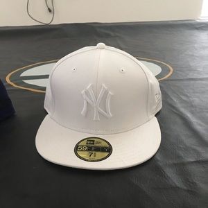 New Era NY Yankees fitted hat.